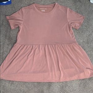 a pink babydoll tee